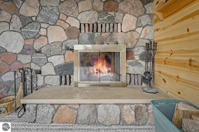 room details with a stone fireplace