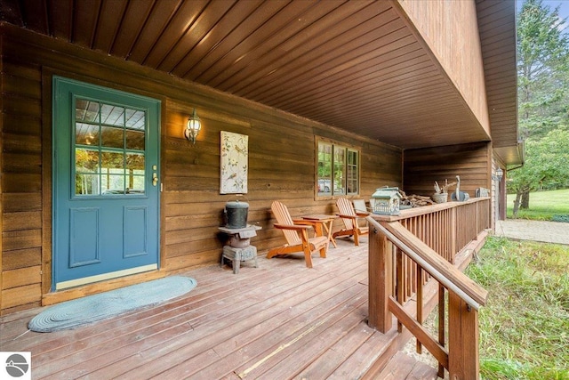 wooden terrace with covered porch