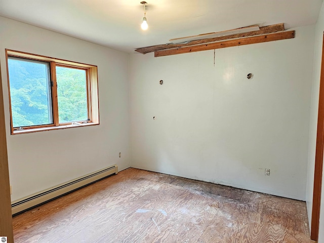 spare room with a baseboard radiator