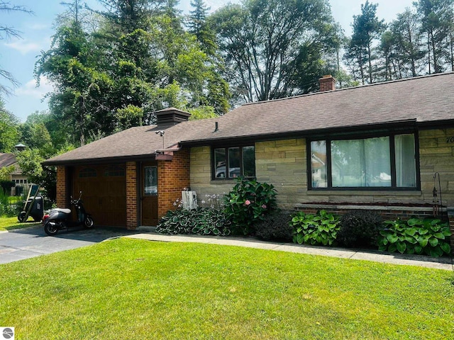 ranch-style home with a front lawn