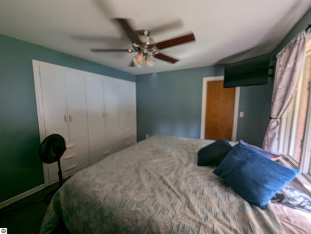 bedroom featuring a closet and ceiling fan