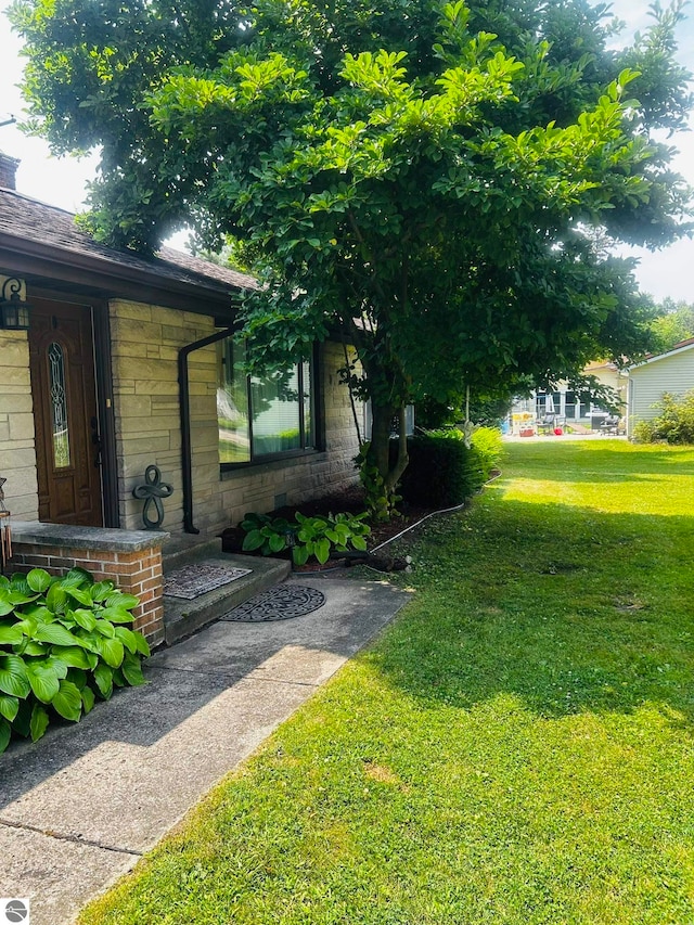 exterior space featuring a yard