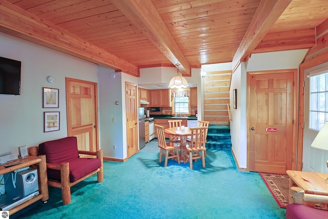 dining space with wood ceiling, light colored carpet, beamed ceiling, and sink