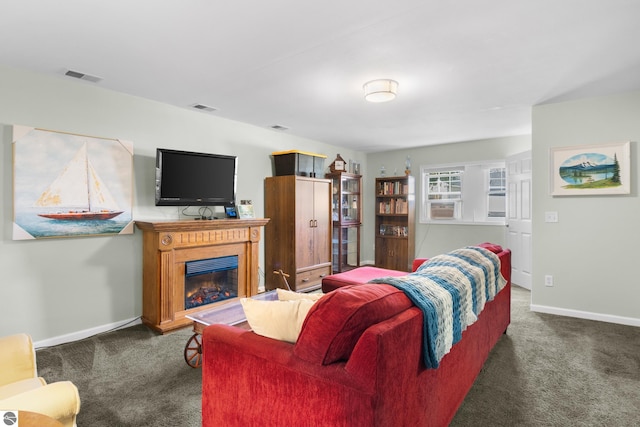 living room featuring dark colored carpet