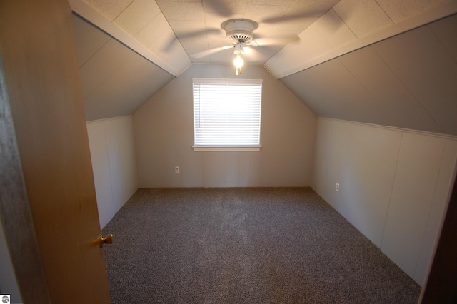 bonus room with carpet, ceiling fan, and vaulted ceiling