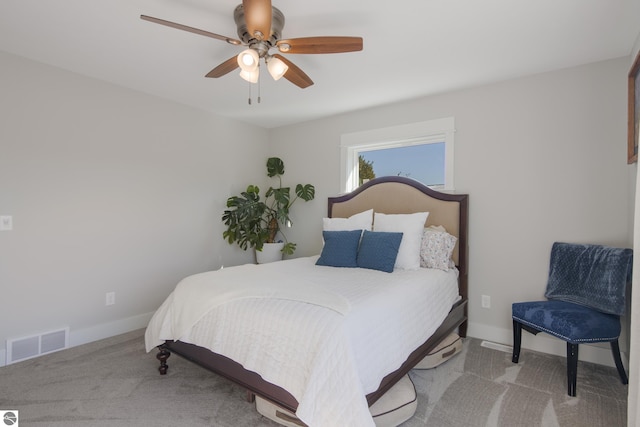 bedroom featuring light carpet and ceiling fan