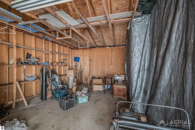 2169 Brady Dr, West Branch, MI 48661 - storage room with a garage