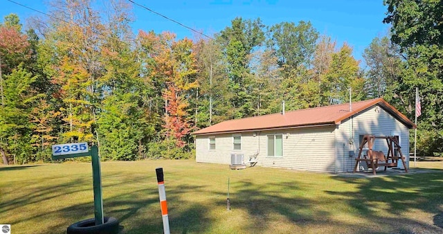 view of yard featuring central AC