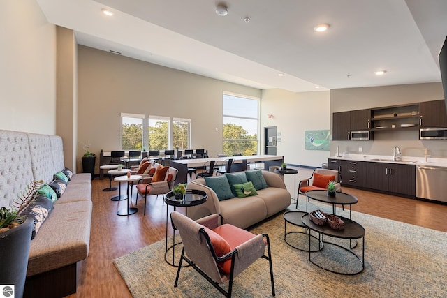 630 S Garfield, Traverse City, MI 49686 - living area with recessed lighting, light wood-style floors, and a high ceiling