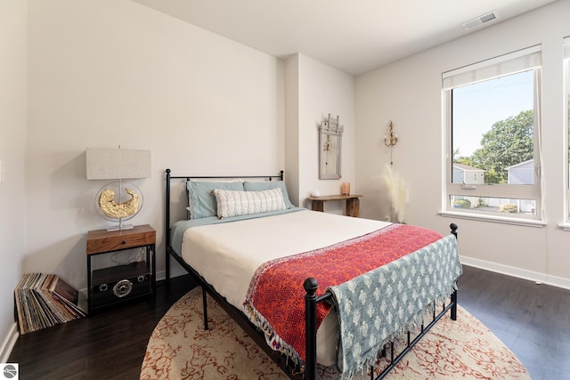 bedroom featuring dark hardwood / wood-style floors