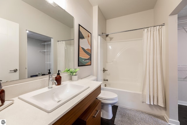 630 S Garfield, Traverse City, MI 49686 - bathroom featuring shower / bath combo with shower curtain, vanity, toilet, and wood finished floors