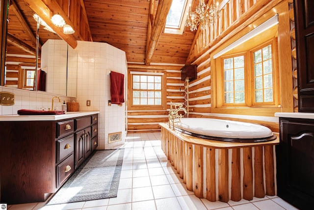 bathroom featuring vanity, vaulted ceiling with skylight, wood ceiling, a bath, and tile patterned floors