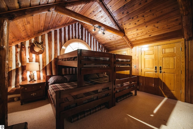 carpeted bedroom with vaulted ceiling with beams, wooden walls, and wooden ceiling