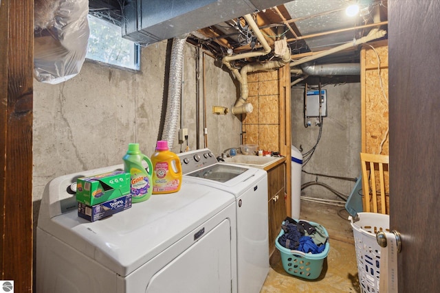 laundry room featuring sink and independent washer and dryer