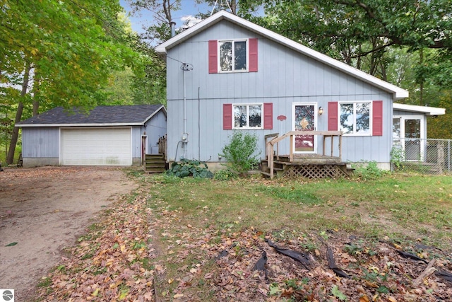 view of front of property with an outbuilding and a garage