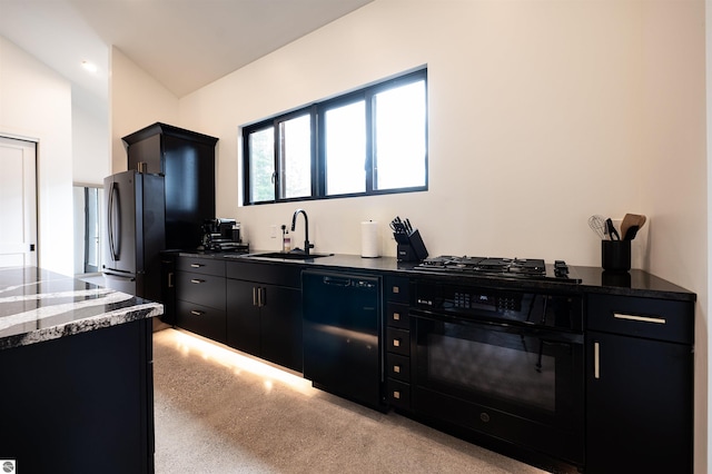 kitchen featuring black appliances, sink, light colored carpet, and stone countertops