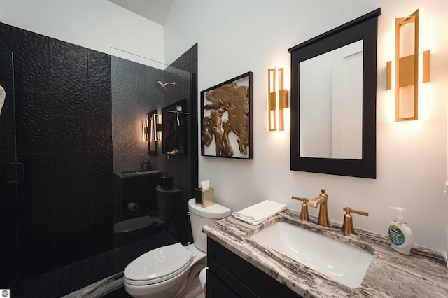 bathroom featuring walk in shower, vanity, and toilet