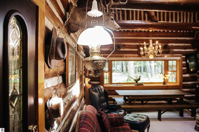 interior space with a chandelier and rustic walls