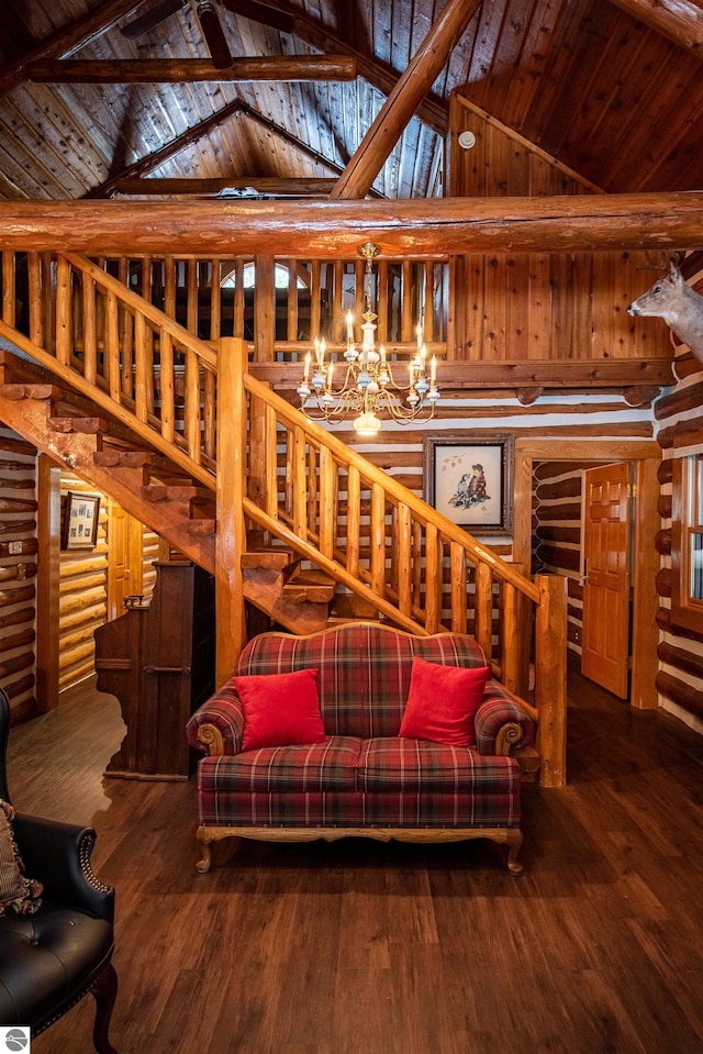 living room with a notable chandelier, wood-type flooring, high vaulted ceiling, and wood ceiling