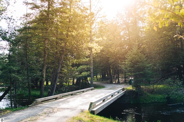 surrounding community with a water view