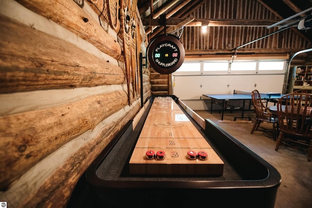 recreation room with concrete floors