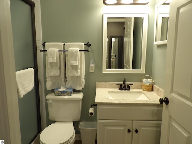 1246 Sunnyside Dr Unit 304Week 8, Cadillac, MI 49601 - full bathroom featuring toilet, vanity, and an enclosed shower
