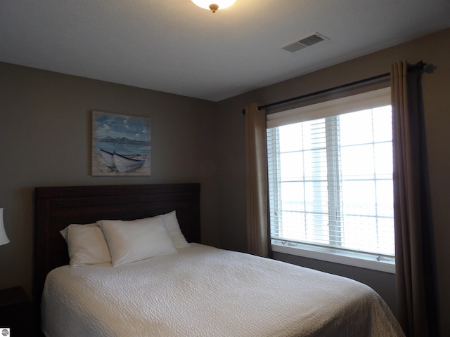 1246 Sunnyside Dr Unit 304Week 8, Cadillac, MI 49601 - bedroom with multiple windows