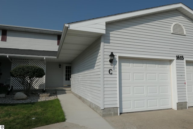 view of property exterior with a garage