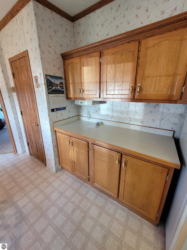 kitchen featuring crown molding