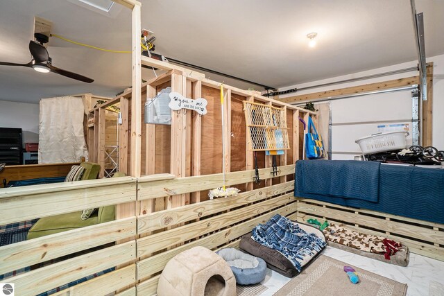 interior space featuring ceiling fan