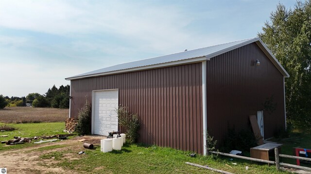 view of outbuilding with a garage