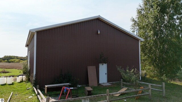 view of home's exterior with a lawn