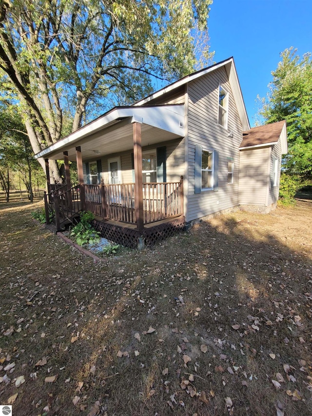 view of front of home with a wooden deck