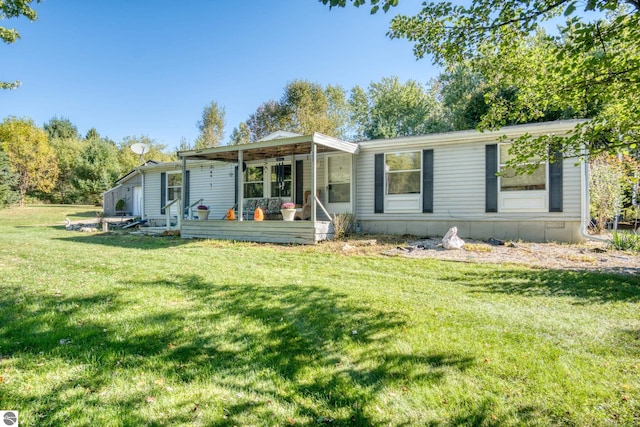 view of front of home with a front yard