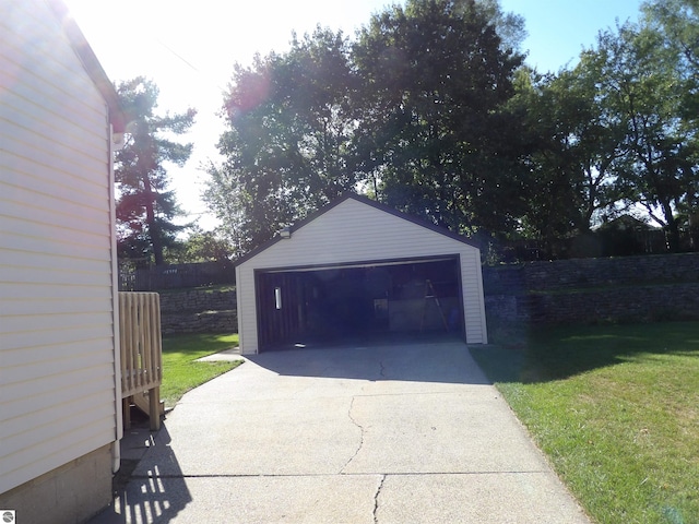 garage with a lawn