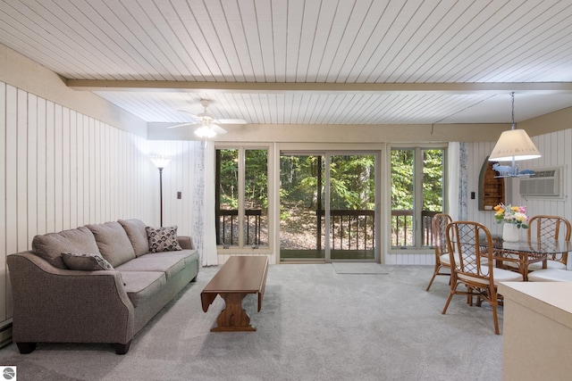 2500 Josef Strasse Unit 410-411, Bellaire, MI 49615 - living room featuring beam ceiling, a ceiling fan, and carpet floors
