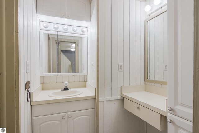 2500 Josef Strasse Unit 410-411, Bellaire, MI 49615 - half bathroom featuring vanity