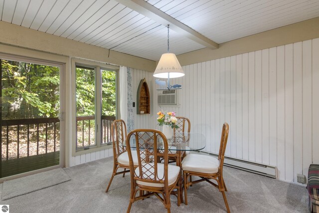 2500 Josef Strasse Unit 410-411, Bellaire, MI 49615 - carpeted dining room with baseboard heating, wood ceiling, a wall mounted air conditioner, and beam ceiling