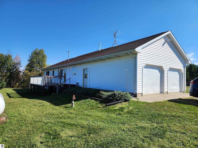 exterior space featuring a deck and a lawn