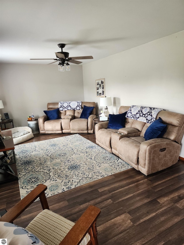 living room with hardwood / wood-style flooring and ceiling fan