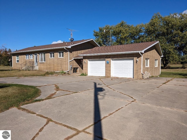 ranch-style home with a garage