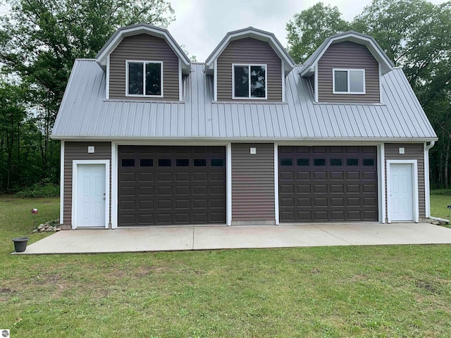 garage with a lawn