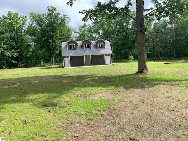 view of yard with a garage