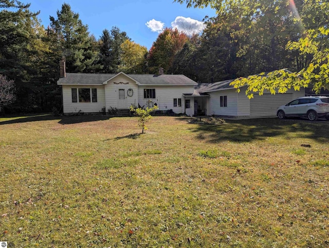 ranch-style house with a front lawn