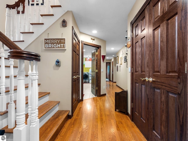 hall with light hardwood / wood-style floors