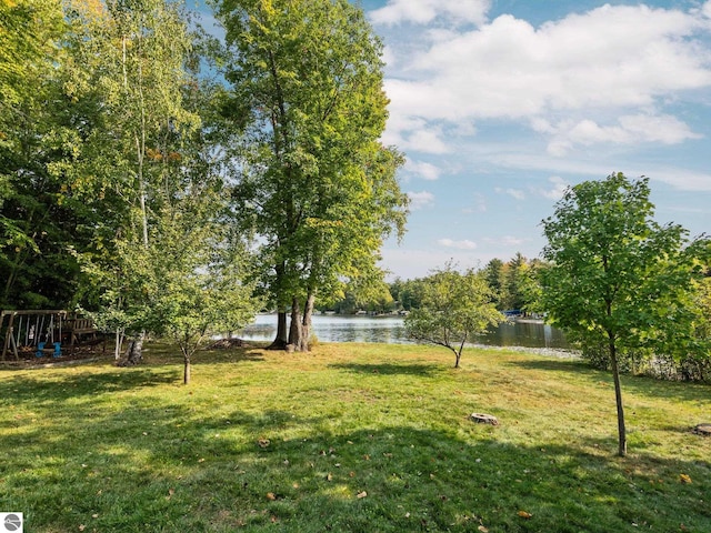 view of yard with a water view