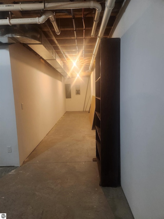 basement featuring electric panel