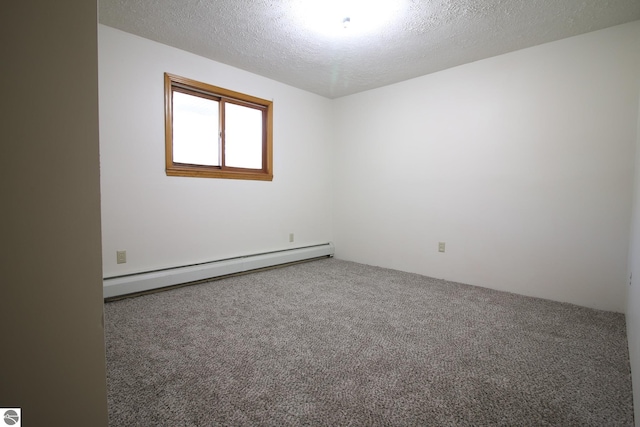 carpeted empty room featuring a textured ceiling and a baseboard radiator