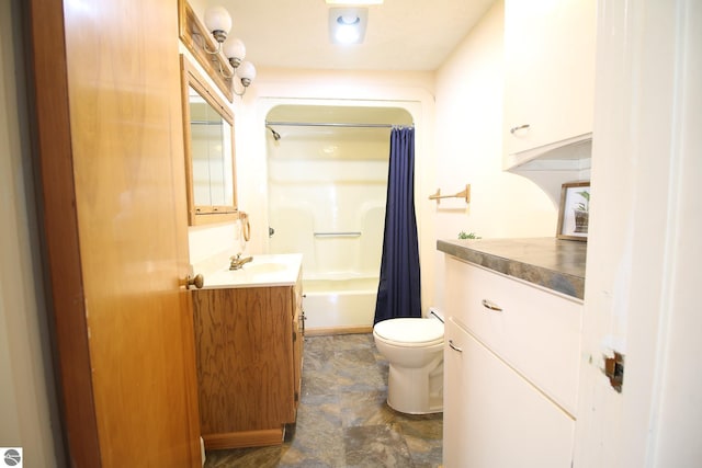 full bathroom with shower / bath combination with curtain, vanity, and toilet