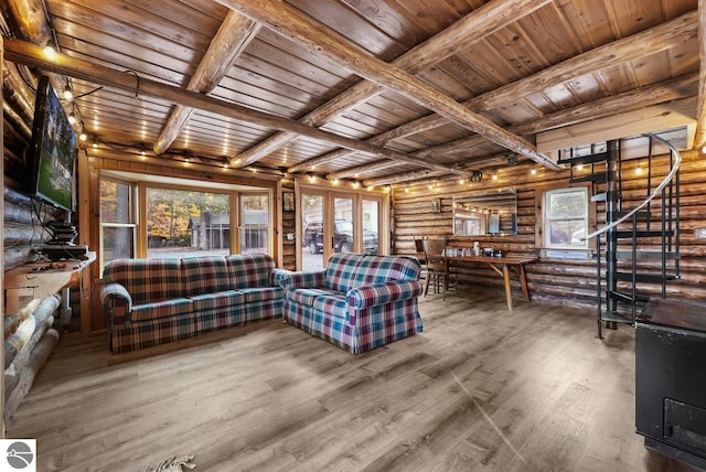 unfurnished living room with french doors, beamed ceiling, wooden ceiling, hardwood / wood-style floors, and rustic walls